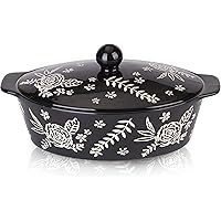 a black casserole with white flowers on it