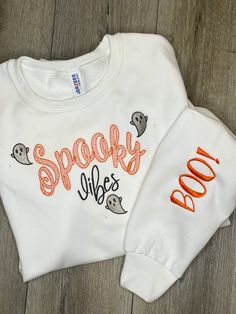 Halloween Spooky Boo Embroidered Crewneck soft and warm sweatshirt.   -Spooky Boo is created on  Unisex white Jerzees Nublend Crewneck sweatshirt. -We use multiple quality brands such as Hanes and/or Gildan.  -Processing and shipping 5-7 days  - Shipping  on Saturday  - Sundays processed orders will ship Monday Halloween White Sweatshirt With Embroidered Graphics, Halloween Long Sleeve Sweatshirt With Custom Embroidery, White Halloween Sweatshirt With Embroidered Graphics, Long Sleeve Halloween Sweatshirt With Custom Embroidery, Long Sleeve Custom Embroidered Sweatshirt For Halloween, Long Sleeve Sweatshirt With Custom Embroidery For Halloween, Casual Halloween Sweatshirt With Custom Embroidery, Halloween White Embroidered Sweatshirt, Custom Embroidered Long Sleeve Top For Halloween