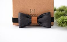 "Grey linen bow tie for boy is limited edition and is precisely handmade by me to bring a luxurious touch into classy look of your son. It will also serve as a wonderful baptism bowtie or wedding bow tie. It'll be good Christmas or Birthday gift to a kid who knows what style is all about.  A modern accessory is perfect for gifts, all you need to do is order a gift wrap. Do not stop yourself from being stylish! ▬ BOW TIE:  ▬ Color: grey. Please note, colors may vary due to your computer's setting Adjustable Detachable Bow Tie As Gift, Classic Satin Bow Tie For Gift, Classic Detachable Bow As A Gift, Classic Satin Bow Tie As A Gift, Luxury Bow Tie As Gift, Classic Satin Bow For Gifts, Classic Satin Bow Gift, Dapper Bow Tie With Detachable Bow As Gift, Classic Bow Tie For Suit Accessories As Gift