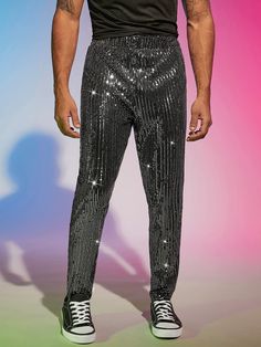 These dress pants feature a unique blend of sequined glitter fabric that adds a fashionable and stylish look to any wardrobe. They are crafted in a slim fit for an enhanced silhouette and come in a variety of colors to match any outfit. They offer a luxurious feel and give any outfit a high-end finish. 94% Polyester, 6% Elastane Imported Pull On closure Hand Wash Only Contrast Sequin Pants For Night Out In Spring, Contrast Sequin Pants For Spring Night Out, Spring Contrast Sequin Pants For Night Out, Glamorous Spring Pants With Contrast Sequin, Glamorous Fall Bottoms With Contrast Sequin, Spring Party Pants With Contrast Sequin, Black Sequin Pants For Party, Glamorous Evening Pants With Contrast Sequin, Glamorous Contrast Sequin Bottoms For Party Season