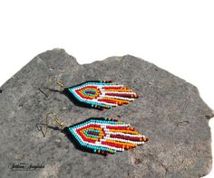 Native American Indian earrings Huichol earrings Black turquoise red Indian beaded Beaded earrings Indian jewelry Colorful earrings Short earrings American earrings Multicolored earring Fringe earrings Navajo earrings 3 inch colorful beaded earrings in American Indian style. These earrings are not authentic Native American earrings, but are made according to my author's design. I was inspired to create these earrings by the bright and colorful culture of the Indians of North and South America. C Southwestern Red Drop Earrings, Southwestern Multicolor Round Bead Earrings, Southwestern Red Earrings With Colorful Beads, Red Southwestern Style Earrings For Festivals, Red Southwestern Style Earrings With Round Beads, Southwestern Red Earrings With Dangling Beads, Southwestern Style Red Earrings With Dangling Beads, Southwestern Style Red Round Bead Earrings, Southwestern Red Earrings For Festival