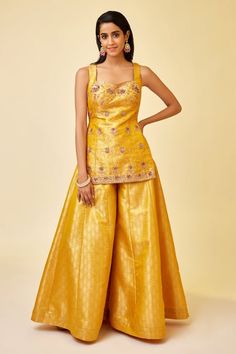 Buy Yellow Brocade Woven Floral Sweetheart Sleeveless Kurta Sharara Set For Women by Shyam Narayan Prasad Online at Aza Fashions. Gold Palazzo Set With Dori Work For Party, Elegant Yellow Floor-length Palazzo Set, Gold Raw Silk Palazzo Set For Reception, Elegant Yellow Sets For Navratri, Yellow Raw Silk Traditional Wear For Party, Sleeveless Resham Embroidery Sharara For Festivals, Traditional Sleeveless Cutdana Sharara, Yellow Sets With Dori Work For Reception, Bollywood Style Yellow Palazzo Set For Festive Occasions