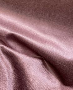 a close up view of a pink fabric