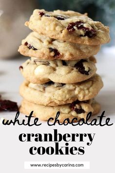 white chocolate cranberry cookies stacked on top of each other with text overlay