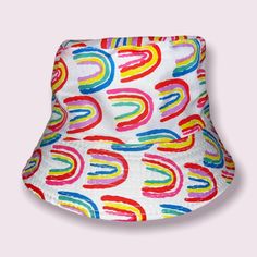 Rainbow Bucket Hat Size: Os Color: White With Rainbow Design Condition: Nwot Material: 100% Polyester Perfect For Summer! *If You Have Any Questions Feel Free To Leave A Comment Or Send Me A Message! *All Offers Considered :) Tags: Summer, Spring, Bucket Hat, Festival, Coachella, Pool, Beach, Pride Casual Adjustable Rainbow Hat, Adjustable Rainbow Hats For Summer, Adjustable Rainbow Summer Hats, Casual Rainbow Hat One Size, Casual Rainbow Hat One Size Fits Most, Casual Rainbow Hat, One Size Fits Most, Trendy Multicolor Sun Hat, Casual Multicolor Bucket Hat, Cute Multicolor Wide Brim Hat