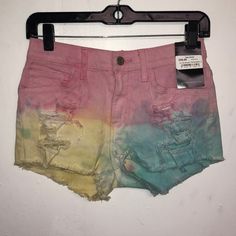 Small For The Dreamers Tie Dye Gypsy Warrior Shorts Multicolor Distressed Bottoms For Spring, Distressed Multicolor Bottoms For Spring, Spring Multicolor Distressed Bottoms, Casual Multicolor Shorts For Festival, Casual Multicolor Festival Shorts, Festival Distressed Short Bottoms, Distressed Festival Shorts, Trendy Bleached Short Bottoms, Trendy Short Bleached Bottoms