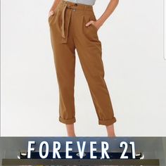 Forever 21 Contemporary Juniors Large (Small Waist 16 Inches) 22" Hip 12.5 Thigh 10" Ankle Chesnut In Color Cuffed Ankle Pleated Waist 2 Front Pockets Back Pockets Matching Belt See Photos For Measurements Trendy Paperbag Waist Bottoms For Fall, Brown Paperbag Waist Pants For Fall, Trendy Paperbag Waist Pants For Fall, Trendy Fitted Pants With Paperbag Waist, Trendy Fitted Paperbag Waist Pants, Brown Paperbag Waist Pants For Spring, Forever 21 Wide Leg Pants For Fall, Trendy Cotton Pants By Forever 21, Forever 21 Casual Bottoms For Fall