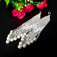 Silvery White Very Long Fringe Earrings. Sparkling, Gentle, Seed Beads Earrings. Indian Jewelry. Boho Style/ Waterfall earrings.These earrings are perfect for a wedding dress.Gradient bead earrings.Boho style Seed Beads earrings. Long Earrings. Beautiful,Sparkling, Elegant Earrings .A beautiful Christmas gift for women and girlfriend. These are long but not heavy earrings. Length of earrings 14 cm (5.50 inches). Width of earrings 0.78 inches. Materials;Czech seed beads.Czech Crystals.Japanese se Cheap White Beaded Earrings For Party, Beaded Bohemian Chandelier Earrings For Party, Bohemian Beaded Chandelier Earrings For Party, Bohemian Party Jewelry With Dangling Beads, Bohemian Dangle Crystal Earrings For Party, Bohemian Dangle Crystal Earrings For Wedding, Pearl Beaded Earrings For Party, Bohemian Chandelier Earrings With Dangling Beads For Party, Festive Beaded Dangle Pearl Earrings