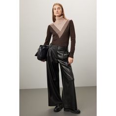 Black faux leather (100% Polyurethane). Pants. Front zipper fly with button closure. 31" inseam. 12" rise. 26" leg opening. Imported. Black Faux Leather Pants, Rent The Runway, Closet Designs, Faux Leather Pants, Black Faux Leather, Front Zipper, High Fashion, Leather Pants, Faux Leather