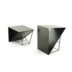 two black tables sitting next to each other on top of a white surface with one side open and the other half closed