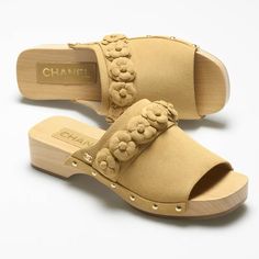 Chanel Suede Open Toe Clogs With Camellia Detail Throughout And Gold Logo On Heel. In A Neutral Tan Hue This Is A Great 3 Season Shoe. In Box With Dust Bag And Tags. Luxury Spring Clogs, Luxury Mules With Wooden Heel For Spring, Luxury Leather Clogs For Spring, Luxury Summer Clogs With Wooden Heel, Designer Clogs With Removable Insole, Designer Clogs With Removable Insole And Round Toe, Luxury Clogs With Removable Insole And Closed Toe, Luxury Clogs With Wooden Open Heel, Luxury Open Toe Clogs With Removable Insole