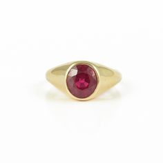 "> Material - 14K Solid Yellow Gold > Gemstone - Genuine Ruby > Gemstone Shape - Round > Gemstone Weight - 3.010 Ct > Gross Weight - 5.55 Grams Any jewelry that carries a Ruby signifies so much passion and love between two people, that it makes Ruby an ideal choice for engagement or Valentine's Day jewelry. \"A drop of the heart's blood of Mother Earth\" is how the ruby is described in the Orient. The Indians call the ruby Ratnanayaka, the lord of the gemstones. The ruby is associ Classic 14k Gold Signet Ring With Round Stone, Classic 14k Gold Birthstone Ring With Smooth Bezel, Classic Ruby Signet Ring As A Gift, Classic Ruby Signet Ring, 14k Gold Signet Ring With Round Cut Gemstone, Classic Signet Ring With Round Cut Gemstone, Classic Gemstone Signet Ring, Yellow Gold Signet Ring With Round Stone For Gift, 14k Gold Signet Ring With Round Stone For Gift