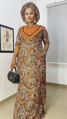 Description: This magnificent Anakara (Wax print ) African dress is perfect for any occasion you want to look your best. its a FULL DRESS WITH HEADWRAP ONLY. Important Note: THIS WAX PRINT NNEXT TO THE STYLE WE POSTED  WILL  BE USE WITH ORANGE BROIDERIE FOR THIS STYLE   You can always request to see other color wax print after you place your order by sending us a message along with your order. PROCESSING: We usually take 3-4  BUSINESS DAYS to make the dress. SHIPPING: We use DHL shipping with tracking and text update. (3 to 5 days) SIZING: What we need from you We have a sizing Chart in the images. Scroll to the right. (Providing your desire measurements for proper fitting ) BUST WAIST HIP SHOULDER SLEEVE LENGTH ARMHOLE Shoulder to waist Length of dress from shoulder to hem Length of skirt Ankara Agbada Styles For Women, Adire Designs, A Shape Gown Ankara, Kaftan Styles For Ladies, Kampala Gown Styles For Ladies, Boubou Styles For Women, Kaftan Styles, Bubu Gown Styles, Ankara Long Gown