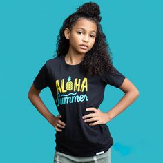 Say "Aloha" to summer fun with our Aloha Summer Kids Short Sleeve T-Shirt! Inspired by the vibrant colors and lively spirit of Hawaii, this t-shirt is perfect for your child's sunny adventures. Made from soft, breathable fabric, it ensures all-day comfort whether they're building sandcastles on the beach or playing in the park. The cheerful Hawaiian design adds a tropical touch to any outfit, making it a must-have for summer. Slim fit with contemporary longer lengthSize up 1-2 sizes for looser fit100% ring-spun cottonUnisex fit100% cottonPlease check our size chart before orderingMachine wash cold. Tumble dry low. Black Graphic Tee For Summer, Graphic Tee For Summer Activities, Black T-shirt With Front Print For Summer, Black Tops With Front Print For Summer, Black Summer Top With Front Print, Fun Letter Print T-shirt For Summer, Summer T-shirt With Graphic Print For Activities, Fun Graphic Print T-shirt For Summer Activities, Graphic Print T-shirt For Beach Season