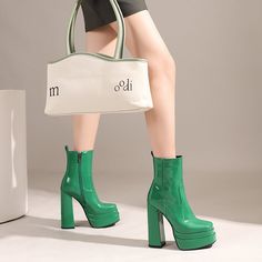 Introducing our newest arrivals ââ‚?the Green Platform Boots! A chic and stylish twist on the classic platform boot. these square-toe beauties are perfect for making a statement. The lush patent leather and chunky block heel add a touch of luxury. while the green hue is perfect for standing out from the crowd. Upper: Patent Leather Lining: Short Plush Outsole: Rubber Toe: Square Toe Closure: Zip Heel: 14cm/5.5'' Platform: 4cm/1.5'' Shaft: 13.5cm/5.3'' Circumference: 25cm/9.8'' Color: Green. Blac Trendy High Heel Platform Boots, Trendy Platform Boots With Lug Sole, Spring Party Platform Boots With Lug Sole, Trendy Heeled Boots With Lug Sole For Party, Trendy Leather Mid-calf Spring Boots, Trendy Ankle Boot With Platform Heel, Chic High Heel Platform Boots For Spring, Trendy Platform Ankle Heeled Boots, Trendy Platform Heeled Ankle Boots