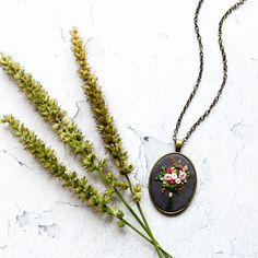 ARIA'S HAND EMBROIDERED BOUQUET NECKLACE Nothing brightens a day like flowers do. So here's some flowers you can wear everyday to bring some cheer to your day and outfit. It never wilts plus it's a conversation piece too! I hand embroider every intricate piece, and each pattern is hand drawn so no two necklaces will be exactly the same. This necklace is proudly handmade in the Philippines. - - - - - - - - - - - - - - - - - - - - - - - - - - - - - - - - - - - - - - - - - - - - - - - - - - - - - D Floral Embroidered Flower Jewelry For Weddings, Embroidered Bouquet, Wildflowers Bouquet, Hand Embroidered Pendant, Embroidery Unique, Embroidered Pendant, Wedding Hands, Unique Gifts For Mom, Embroidery Gifts