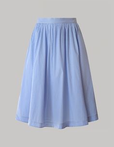 The Grace skirt is a chic and versatile wardrobe essential designed with radiant summer days in mind. Crafted from light and breathable organic cotton Vichy stretch fabric, this pale blue flowy skirt with a high waistline falls just below the knees, offering a timeless silhouette. Whether for casual or polished looks, experience comfort, and sophistication effortlessly with this stylish midi skirt. Aspen Outfits, Blue Flowy Skirt, Light Summer Clothes, Stylish Midi Skirt, Anna Marie, Corset Lace, Versatile Wardrobe, Blue Gingham, Light Summer