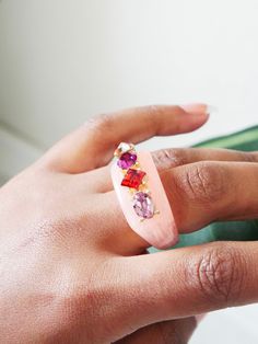 This is a stunning ring features a unique rhinestone gem square ring design. Perfect for the coming summer season. Available in PKG and WHG. Model ring size 6/7 You can still wear it if your ring size is 8 Candy Ring, Square Ring, Square Rings, Pink Ring, Summer Season, Wear It, Ring Designs, Ring Size, Gems