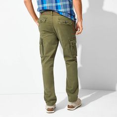 These St. John's Bay men's mid-rise cargo pants will be a year-round casual style essential. Made from stretch-cotton, this straight-leg style has a button-zip closure and 5-pocket tailoring. Wear them with a polo shirt or tee. Front Style: Flat FrontFeatures: Belted, Stretch FabricClosure Type: Button & ZipperFit: Straight FitPockets: 2 Cargo Side Pockets, 2 Back Button Pockets, 2 Side Slip PocketsRise: Mid RiseFiber Content: 98% Cotton, 2% SpandexFabric Description: CanvasInseam: 30 InLeg Styl Green Cotton Cargo Jeans With Flap Pockets, Casual Cotton Work Pants With Flap Pockets, Pants Cargo, Cargo Pant, Pants Men, Fashion Essentials, Stretch Cotton, Cargo Pants, Casual Style