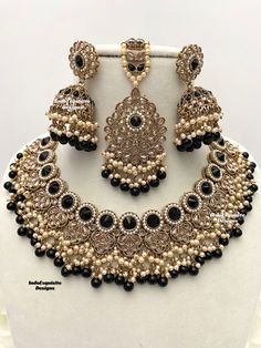 Antique Gold Polki Necklace Set comes with Jhumki earrings and tikka / Indian Jewelry/ High Quality Kundan and Polki Jewelry/ Bollywood Jewelry/Wedding Jewelry/black  All items are shipped from Brampton, Ontario, Canada. If you need your item by a certain day, please reach out to us for express delivery option before placing the order so that we can update the shipping for you. Standard shipping/delivery timeline Below are the delivery timeline estimates once the order ia shipped ---> USA delive Black And Gold Indian Jewelry Set, Festive Black Necklaces For Celebration, Festive Black Kundan Necklace For Celebration, Elegant Black Bridal Necklace For Festive Occasions, Black Kundan Necklace In Temple Jewelry Style, Black Kundan Jewelry With Meenakari, Black Kundan Necklace For Festivals And Celebrations, Black Kundan Necklace For Celebrations And Festivals, Black Necklace With Latkans For Festive Occasions