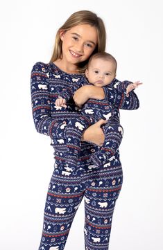 Convertible feet let you adjust the coverage of these supersoft pajamas made from breathable, moisture-wicking fabric to give your kiddo maximum comfort. A convenient two-way front-zip closure also ensures quick and easy changes. This item is designed to fit snugly, as it is not flame resistant Two-way zip closure with chin guard Fold-over cuffs on sizes Newborn to 3–6 months help prevent accidental scratches Gripper feet Moisture-wicking fabric engineered for dryness and comfort 95% rayon, 5% s Winter Matching Sleepwear For Loungewear, Matching Winter Sleepwear For Loungewear, Snug Long Sleeve Sleepwear, Matching Long Sleeve Winter Sleepwear, Super Soft Long Sleeve Onesie For Playtime, Super Soft Long Sleeve Onesie For Bedtime, Long Sleeve Super Soft Onesie For Bedtime, Super Soft Snug Sleepwear For Lounging, Long Sleeve Onesie For Bedtime