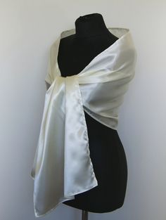 A very elegant satin shawl wrap shrug for your wedding , party or evening dress Color: ivory ( also available in white or black ) Size : 160 cm x 40 cm You can use it as a wrap, shawl or stola. You can find a matching sating bridal purse / bag in our Etsy shop or just contact us. We accept credit cards. Elegant Fitted White Shawl, Classic Silk Scarf For Wedding, Classic Silk Scarf For Weddings, Elegant White Silk Scarf For Party, Elegant White Evening Shawl, Elegant Cream Shawl For Evening, Cream Silk Shawl For Wedding, Cream Shawl For Evening, Elegant Cream Silk Scarf For Wedding