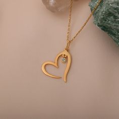 "Aquamarine represents luxury and beauty. The most important benefits are that it is, calming and encouraging. Our heart necklace, crowned with 14K solid gold birthstones, is suitable for daily use. You can choose and buy it with the stone of your birth month. It is a nice gift option for yourself, your lover, your friend or your mother. The birthstone of those born in March is aquamarine. Visit our shop: https://www.etsy.com/shop/StyleDiamond?ref=seller-platform-mcnav 🔸🔸 Our elegant, style an Yellow Gold Gemstone Heart Necklace For Anniversary, Anniversary Yellow Gold Heart Necklace With Gemstone, Gold Gemstone Heart Necklace For Wedding, Fine Jewelry 14k Gold Heart Necklace With Birthstone, Elegant 14k Gold May Birthstone Charm Necklace, Elegant 14k Gold Charm Necklace With Emerald, Gold Heart-cut May Birthstone Necklaces, Gold Heart-shaped Birthstone Necklace With Gemstone, Gold Heart-shaped Birthstone Necklace