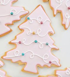 an instagram page with some cookies decorated like christmas trees and decorations on it,