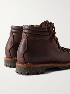 In the late '90s, Yuki Matsuda travelled across the USA to apprentice as a shoemaker – today, his brand Yuketen is dedicated to the craft. These 'Vettore' boots have been made in Italy from artfully worn-in leather and have the hallmarks of hiking styles, including padded collars and lugged soles. Leather Boots For Men, Mens Leather Boots, Late 90s, Boots For Men, Brown Leather Boots, The Craft, Mr Porter, Lace Up Boots, Boots Men