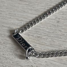 Dior Logo Is Necklace With Small Piercing On The Logo Small D Logo On The Clasp Never Worn Can Be Adjustable For All Neck Sizes Choker Or Long Designer Silver Jewelry With Clavicle Chain, Luxury Silver Necklaces With Silver-tone Logo, Luxury Silver Necklaces With Logo Plaque, D Logo, Dior Logo, Dior Jewelry, Logo Color, Vintage Logo, Womens Jewelry Necklace