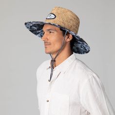 Choose the Mens Straw Lifeguard with Ocean Wave Under-brim, a stylish hat perfect for a day by the beach. Finessed from 100% straw with a 4.5" brim, featuring a unique wave print under-brim, damask woven wave patch, and a pinch crown. UPF 50+ sun protection ensures the safe wear of this fashionable, tropical lifeguard hat. Features: Color: BlueMaterials: 100% StrawBrim Size: 4.5" BrimSize: 59cmSun Protection: UPF 50+ Uv Protection Panama Hat With Curved Brim, Upf 50+ Short Brim Panama Hat For Pool, Casual Straw Hat With Curved Brim For Warm Weather, Upf 50+ Brimmed Panama Hat For Pool, Beachy Panama Hat With Uv Protection And Curved Brim, Adjustable Wide Brim Bucket Hat For Pool, Casual Flat Brim Sun Hat In Toquilla Straw, Casual Toquilla Straw Sun Hat With Flat Brim, Casual Straw Bucket Hat With Upf 50+