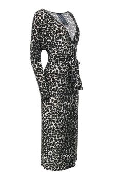 Wrap yourself up in some seriously ferocious style with this Norma Kamali dress! The classic maxi dress is given a safari chic upgrade with a luxe leopard print design in an easy and breezy wrap silhouette. The perfect wow piece to dress up and down! Style with strappy sandals and a wide brim hat for a boho-inspired ensemble, or get dolled up for your next cocktail party with sparkly pumps and a statement necklace. No matter where or how you rock this frock, you’re guaranteed to be looking total Spring Leopard Print Maxi Dress, Black Fitted Belted Maxi Dress, Leopard Print Maxi Dress For Fall Party, Fitted Belted Maxi Dress For Fall, Belted Fitted Maxi Dress For Fall, Fitted Belted Maxi Dress For Night Out, Spring Leopard Print Maxi Dress For Night Out, Fall Party Maxi Dress In Leopard Print, Chic Leopard Print Evening Maxi Dress