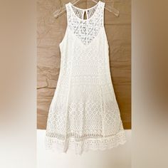 Material: [Crochet Body] 52% Nylon, 38% Cotton, 10% Viscose / [Lining] 100% Cotton Color: Linen White Size: Small Tags Removed. Never Worn. Summer Lace Mini Dress With Crochet Details, Lace Crochet Dress With Crochet Trim For Brunch, White Sleeveless Crochet Dress With Scalloped Lace, White Sleeveless Lace Crochet Dress, White Crochet Lace Summer Dress, White Crochet Dress With Scalloped Lace For Spring, White Crochet Dress With Scalloped Lace For Brunch, White Crochet Lace Dress For Brunch, White Lace Crochet Dress For Brunch