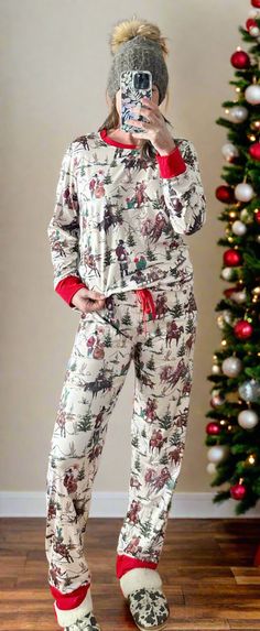 Here's our bestselling Cowboy Santa Christmas Pajamas! This print is so fun and perfect for the whole family! And comfy too! At Razels' we pride ourselves in delivering high-quality, well-made PJs for the whole family! And this set delivers! Cowboy Santa delivering packages on his best horses....except one looks a little broncy! Yeehaw! Start a new tradition and get a little Western this Christmas with our Cowboy Santa PJs!Perfect Pjs for all our Cowboys & Cowgirls, young and old alike! 🤠💗 🎄🎅🤶 I am restocking these fabulous pajamas for October delivery - please sign up for a restock request so that you don't miss out on our bestselling Christmas Pajamas! 🎄🎅🤶 ⚡ MATCHING KIDS Pajamas ALSO AVAILABLE IN SIZES 3-6 months - 14/16. ⚡Kids matching pjs are sold in separate listing. Razels' Western Christmas Pajamas, Western Pjs, Matching Family Christmas Pjs, Adult Christmas Pajamas, Pjs Matching, Cowboy Santa, Santa Pajamas, Christmas Pjs Family, Holiday Pjs