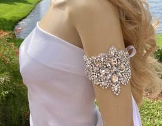 Unique rhinestone comb is made with Swarovski crystals.  Perfect for wedding, prom or any formal event.    Ties with a white satin bow (unless another color is requested). Crystal Wedding Bracelet, Wedding Jewelry Bridesmaids, Gatsby Jewelry, Cuff Pattern, Bridal Cuff, Arm Bracelets Upper, Arm Bracelet, Bridesmaids Jewelry, Formal Jewelry