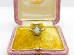 Details: A fantastic and wonderfully designed antique Victorian 18ct yellow gold floral cluster ring set with cabochon opal surrounded by diamonds hallmarked to the interior c1890, the stones have been tested. This is a wonderful item that would make a perfect gift or addition to any collection. The BOX pictured is for PRESENTATION ONLY and is NOT included in the listings but used to frame the pictures unless specifically stated otherwise.  Condition Report: The item is in good condition, all ou Victorian Gold Cluster Ring With Gemstone, Heirloom Gold Opal Cabochon Ring, Heirloom Gold Opal Ring With Cabochon, Antique Yellow Gold Opal Ring Collectible, Yellow Gold Opal Ring Collectible Antique Style, Antique Yellow Gold Opal Ring For Collectors, Vintage Opal Rings In Yellow Gold, Yellow Gold Cabochon Opal Ring Collectible, Cabochon Yellow Gold Opal Ring Collectible