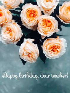 a bouquet of roses with the words happy birthday, dear teacher