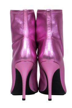 Let your inner glam rockstar out with these totally eye-catching booties from Giuseppe Zanotti! Made in a flashy pink tone, these bad boys are the perfect statement piece for your next night out. Style with a pleated leather skirt and a cropped sweater for an edgy and out-of-this-world look that’s sure to turn heads as soon as you step in the club! Size 9 (EU 39) Box included Made in Italy Slip on Pointed toe Heel height 4.5" Pink Boots For Night Out During Party Season, Edgy Spring Heeled Boots For Party, Edgy Heeled Boots For Spring Party, Trendy Heeled Boots For Party With Reinforced Heel, Trendy Heeled Boots With Reinforced Heel For Party, Pink Boots For Party Season And Night Out, Edgy Mid-calf High Ankle Boots For Parties, Pink Boots For Night Out And Party Season, Pink Pointed Toe Boots For Party Season