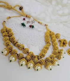 Check out this item in my Etsy shop https://www.etsy.com/listing/1371948634/gold-mala-indian-necklace-indian-jewelry Gold Round Pearl Necklace For Festivals, Festive Gold Bollywood Jewelry, Festive Bollywood Gold Jewelry, Gold Pearl Necklace With Latkans Temple Style, Gold Jewelry With Zari Work For Festivals, Gold Pearl Necklace With Meenakari For Festive Occasions, Gold Pearl Necklace With Intricate Design For Diwali, Diwali Gold Pearl Necklace With Intricate Design, Festive Gold Jewelry Sets With Round Beads