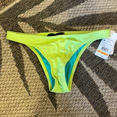 Small Color: Acid Lime Green Swimwear For Surfing In Spring, Green Swimwear For Surfing, Green Surfing Swimwear For Spring, Green Fitted Swimwear For Surfing, Neon Stretch Summer Swimwear, Neon Stretch Swimwear For Swimming, Neon Stretch Swimwear, Neon Stretch Swimwear For Pool, Trendy Fitted Swim Briefs