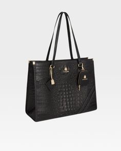 This versatile black faux crocodile skin tote bag, crafted from durable materials, is perfect for all your large tote bag needs and everyday use. Its spacious interior easily accommodates a laptop and many other essentials, while the unique crocodile skin texture adds a touch of sophistication. This bag will quickly become your go-to bag for all your travel and daily needs. Everyday Crocodile Pattern Tote Satchel, Luxury Everyday Shoulder Bag With Crocodile Pattern, Business Tote Shoulder Bag With Crocodile Pattern, Luxury Crocodile Pattern Everyday Shoulder Bag, Business Crocodile Pattern Tote Shoulder Bag, Business Tote Bag With Crocodile Pattern, Elegant Everyday Satchel With Crocodile Pattern, Elegant Everyday Crocodile Pattern Satchel, Modern Tote Bag With Crocodile Pattern