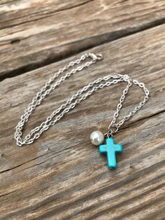 "Dainty pearl and cross necklace add a little charm to your day! -necklace is silver and is approx 18\" in length and made of stainless steel -this listing is for one (1) necklace -all necklaces come with a turquoise cross bead, and a pearl. All necklaces come with an 18\" chain, please specify in notes if you would like longer or shorter. *extra charges may apply for lengthening. All my jewelry comes gift boxed and ready for gift giving, whether it is a gift for you or someone special. Thank yo Turquoise Cross Necklace, Boho Styl, Necklace Cross, Turquoise Cross, Western Jewelry, Hypoallergenic Earrings, Cross Charms, Boho Stil, Pretty Jewellery