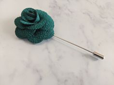 Upgrade your wardrobe in style with this stunning green flower lapel pin. Perfect gift for him, this unique high quality accessory will elevate any suit lapel or jacket. Elegant Green Flower Brooches, Green Flower Brooch Pins, Green Flower-shaped Brooch Pins, Green Flower Shaped Brooch Pins, Elegant Green Brooches With Handmade Flowers, Elegant Green Pins For Gifts, Elegant Green Lapel Pin For Wedding, Elegant Green Wedding Lapel Pin, Flower Lapel