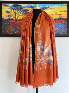 100% Handwoven Pashmina  and Hand embroidered Designer shawl Size: 100 x 200cm / 40 x 80 in / 1 x 2 meters Craft &Technique:Kashmiri sozni is among the elite legacy of Kashmir. Artisanal masterpieces are handcrafted by the Sozin kaars (needle workers), with a fine needle. The traditional motfis comprise paisley, iris, lotus, and saffron flowers, called badum in the local terminology. Nature always inspires these beautiful motifs, hence even cherries and grapes along with daffodils and marigolds Pashmina Shawl Embroidery Hands, Bohemian Scarf With Embroidered Border, Traditional Patterned Scarves For Eid, Bohemian Embroidered Pashmina Scarf, Bohemian Shawl Scarf With Resham Embroidery, Bohemian Shawl With Resham Embroidery, Winter Festive Dupatta With Motifs, Traditional Brown Jamawar Dupatta, Festive Bohemian Scarf With Embroidered Border