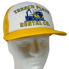 Trench Plate Rental Co Vintage 80s Trucker Hat Construction Road Work Yellow Vernon Headliner Mesh Snapback Baseball Cap I always ship hats in a box. CONDITION: In gently used condition - has a faint spot. Has been cleaned and sanitized. See photos. Vintage White Trucker Hat With Short Brim, Vintage Yellow Baseball Cap Trucker Hat, Vintage Yellow Trucker Baseball Cap, Vintage Yellow Trucker Hat, Yellow Vintage Trucker Hat, Vintage Yellow Snapback Trucker Hat, Vintage Yellow Adjustable Hat, Retro Yellow Trucker Hat With Curved Brim, Retro Yellow Curved Brim Trucker Hat