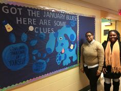 two women are standing in front of a sign that says, got the january blues here are some clues