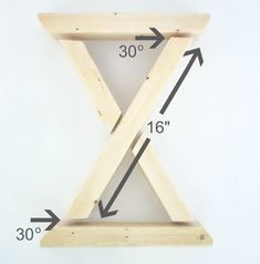 a wooden shelf that has measurements for the top and bottom of it, as well as an arrow