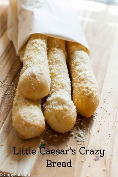 little caesar's crazy bread sticks on a cutting board