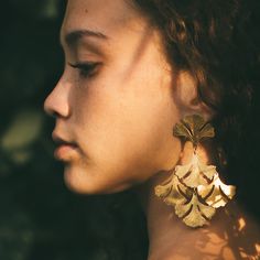 Full of movement, lush leaves sway and glisten in hand hammered brass. Sterling posts. Nickel and lead free.3.5” [9 cm] long. Gold Bamboo Earrings, Constellation Earrings, Orchid Earrings, Galaxy Earrings, Hair Necklace, Bali Earrings, Butterfly Earrings Gold, Oversized Earrings, Peacock Earrings