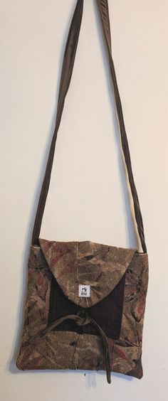 medium bag with cross body strap. pocket inside with zip. lined with thick brown valour and blackout liner from curtains, double lined  flap with tie Size 11.5x11 inch. Flat style. Strap 57inch Handmade in my home studio using reworked upcycled textiles. Curtains Double, Herringbone Bag, Postman Bag, Tweed Style, Upcycled Textiles, Medium Bag, Card Bag, Flat Style, Saddle Bag